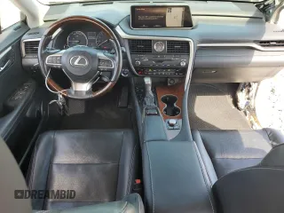 2018 Lexus RX 450hL Premium with VIN JTJDGKCAXJ2004427, listed as a Copart auction lot 55213625 with 94,557 mi miles and Salvage title. Bid and sale history available at DreamBid. Image 8.