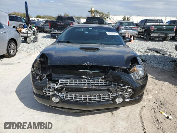 2004 Ford Thunderbird Deluxe z VIN 1FAHP60A74Y112611, wystawiony jako Copart lot #46393905 z przebiegiem 41 120 mil mil oraz Szkoda całkowita • Salvage title. Historia ofert i sprzedaży dostępna na DreamBid. Obrazek 5.