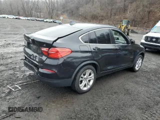 2015 BMW X4 xDrive28i with VIN 5UXXW3C54F0M89256, listed as a Copart auction lot 41388973 with 136,359 mi miles. Bid and sale history available at carsss.com. Image 3.