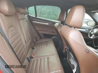 2019 Alfa Romeo Stelvio Ti z VIN ZASPAKBN2K7C35002, wystawiony jako Copart lot #55448965 z przebiegiem 109 812 mil mil oraz Tytuł czysty. Historia ofert i sprzedaży dostępna na DreamBid. Obrazek 11.