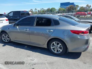 2016 Kia Optima LX with VIN 5XXGT4L33GG106342, listed as a IAAI auction lot 42272945 with 94,645 mi miles and . Bid and sale history available at DreamBid. Image 14.