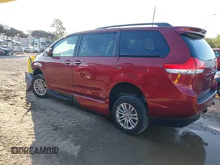 2014 Toyota Sienna XLE with VIN 5TDYK3DCXES473671, listed as a IAAI auction lot 42243030 with 70,052 mi miles and . Bid and sale history available at DreamBid. Image 3.