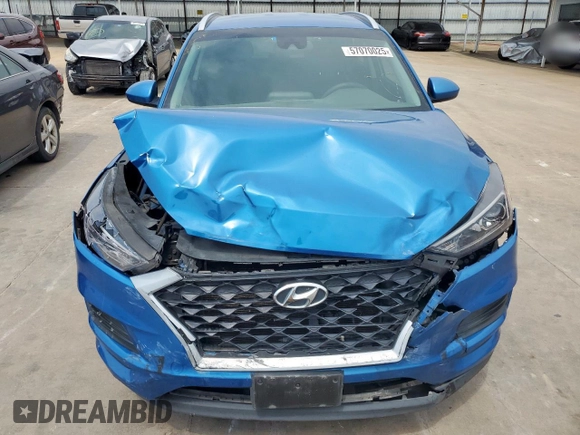 2019 Hyundai Tucson Value with VIN KM8J33A48KU913336, listed as a Copart auction lot 57070025 with 83,037 mi miles and Salvage title. Bid and sale history available at DreamBid. Image 5.