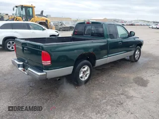 1998 Dodge Dakota SLT with VIN 1B7GL22Y8WS722611, listed as a IAAI auction lot 40964684 with 213,429 mi miles and . Bid and sale history available at DreamBid. Image 4.