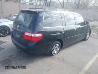 2007 Honda Odyssey EX-L with VIN 5FNRL38627B041332, listed as a IAAI auction lot 41934767 with 234,332 mi miles and . Bid and sale history available at carsss.com. Image 4.
