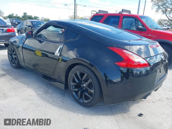 2017 Nissan 370Z with VIN JN1AZ4EH5HM954458, listed as a IAAI auction lot 41629907 with 113,606 mi miles. Bid and sale history available at carsss.com. Image 3.