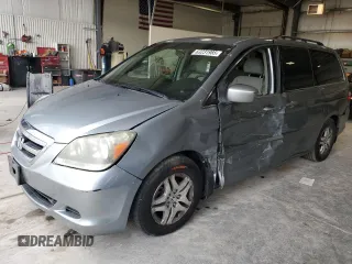 2007 Honda Odyssey EX with VIN 5FNRL38447B000375, listed as a Copart auction lot 63231985 with 98,364 mi miles and Salvage title. Bid and sale history available at DreamBid. Image 1.