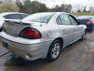 2004 Pontiac Grand Am GT with VIN 1G2NW52EX4C109231, listed as a IAAI auction lot 41845165 with 135,735 mi miles. Bid and sale history available at carsss.com. Image 4.