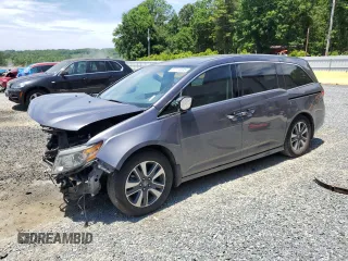 2016 Honda Odyssey Touring Elite с VIN 5FNRL5H96GB083279, выставлен на аукционе Copart как лот 57224535 с пробегом 241 758 миль миль и Списание • Salvage title. История ставок и продаж доступна на DreamBid. Изображение 1.
