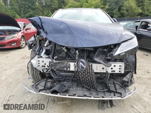 2022 Lexus RX with VIN JTJJGKFA7N2029399, listed as a Copart auction lot 70560884 with 13,672 mi miles and Salvage Title. Bid and sale history available at carsss.com. Image 5.