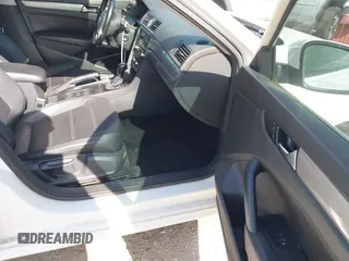 2014 Volkswagen Passat Wolfsburg Edition with VIN 1VWAS7A30EC053025, listed as a IAAI auction lot 42579059 with 168,446 mi miles and . Bid and sale history available at DreamBid. Image 5.