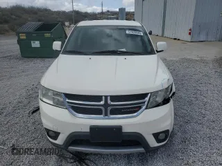 2013 Dodge Journey SXT with VIN 3C4PDDBG1DT619798, listed as a Copart auction lot 51820685 with 209,404 mi miles and Salvage Title. Bid and sale history available at DreamBid. Image 5.
