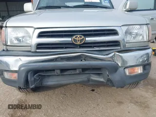 1999 Toyota 4Runner SR5 z VIN JT3GN86R1X0123115, wystawiony jako IAAI lot #41505478 z przebiegiem 173 141 mil mil oraz . Historia ofert i sprzedaży dostępna na DreamBid. Obrazek 12.