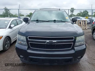 2011 Chevrolet Suburban with VIN 1GNWKMEG1BR374950, listed as a IAAI auction lot 42781182 with 304,690 mi miles and . Bid and sale history available at DreamBid. Image 6.