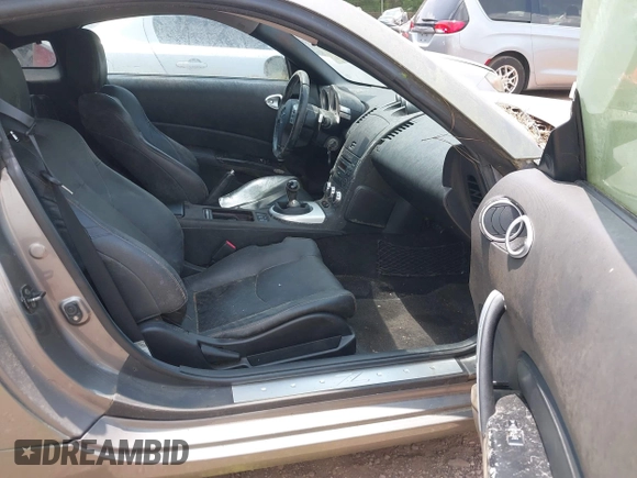 2008 Nissan 350Z Nismo z VIN JN1BZ34E88M753028, wystawiony jako IAAI lot #42410654 z przebiegiem 122 854 mil mil oraz . Historia ofert i sprzedaży dostępna na DreamBid. Obrazek 5.