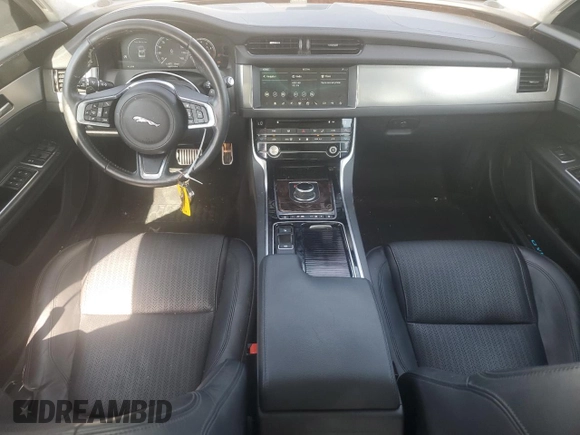 2020 Jaguar XF with VIN SAJBE4GX7LCY83474, listed as a Copart auction lot 56100914 with 36,919 mi miles and Salvage Title. Bid and sale history available at DreamBid. Image 8.