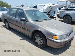 1992 Honda Accord with VIN 1HGCB7653NA170777, listed as a IAAI auction lot 42570971 with 141,912 mi miles and . Bid and sale history available at DreamBid. Image 1.