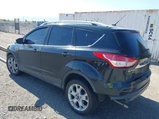 2014 Ford Escape Titanium with VIN 1FMCU0JX6EUB49652, listed as a IAAI auction lot 42136494 with 195,108 mi miles. Bid and sale history available at carsss.com. Image 3.