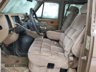 1995 GMC Vandura z VIN 1GDEG25KXSF550311, wystawiony jako Copart lot #78730594 z przebiegiem 149 663 mil mil oraz Szkody całkowita. Historia ofert i sprzedaży dostępna na DreamBid. Obrazek 7.