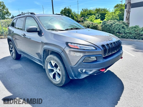 2018 Jeep Cherokee Trailhawk z VIN 1C4PJMBX0JD600413, wystawiony jako Copart lot #60336385 z przebiegiem 64 875 mil mil oraz Czysty tytuł • Clean title. Historia ofert i sprzedaży dostępna na DreamBid. Obrazek 2.