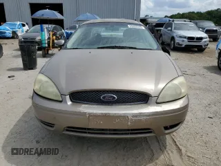 2004 Ford Taurus SE z VIN 1FAFP53U44A122559, wystawiony jako Copart lot #55606595 z przebiegiem Nie podano mil oraz Szkoda całkowita • Salvage title. Historia ofert i sprzedaży dostępna na DreamBid. Obrazek 5.