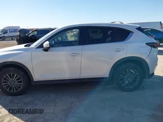 2017 Mazda CX-5 Touring with VIN JM3KFBCL8H0152748, listed as a IAAI auction lot 41732910 with 68,296 mi miles. Bid and sale history available at carsss.com. Image 14.