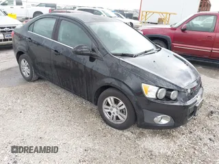 2016 Chevrolet Sonic LT z VIN 1G1JC5SH6G4118464, wystawiony jako IAAI lot #42004852 z przebiegiem 99 051 mil mil oraz . Historia ofert i sprzedaży dostępna na DreamBid. Obrazek 1.