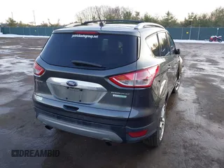 2015 Ford Escape Titanium with VIN 1FMCU0J92FUB74972, listed as a IAAI auction lot 41164519 with 228,785 mi miles and . Bid and sale history available at DreamBid. Image 4.