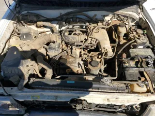 1999 Toyota Tacoma z VIN 4TAVL52N1XZ513889, wystawiony jako Copart lot #50007235 z przebiegiem 225 799 mil mil oraz Szkoda całkowita • Salvage title. Historia ofert i sprzedaży dostępna na DreamBid. Obrazek 11.