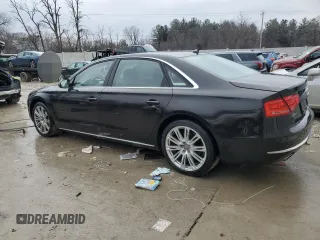 2014 Audi A8 3.0L TDI z VIN WAURMAFD3EN001307, wystawiony jako Copart lot #43476125 z przebiegiem 85 921 mil mil oraz Tytuł czysty. Historia ofert i sprzedaży dostępna na DreamBid. Obrazek 2.