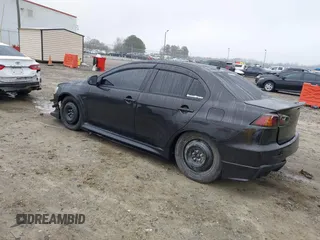 2010 Mitsubishi Lancer Evolution GSR with VIN JA32W8FV1AU012725, listed as a IAAI auction lot 41542629 with 124,347 mi miles and . Bid and sale history available at DreamBid. Image 3.