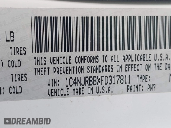 2015 Jeep Patriot Sport with VIN 1C4NJRBBXFD317811, listed as a IAAI auction lot 41579467 with 107,002 mi miles and . Bid and sale history available at carsss.com. Image 9.