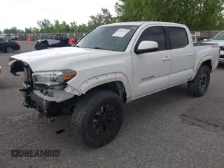 2020 Toyota Tacoma SR5 z VIN 5TFCZ5AN5LX242708, wystawiony jako IAAI lot #42356772 z przebiegiem 65 442 mil mil oraz . Historia ofert i sprzedaży dostępna na DreamBid. Obrazek 17.