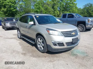 2016 Chevrolet Traverse LT z VIN 1GNKRGKDXGJ296003, wystawiony jako IAAI lot #42209938 z przebiegiem 94 560 mil mil oraz . Historia ofert i sprzedaży dostępna na DreamBid. Obrazek 1.