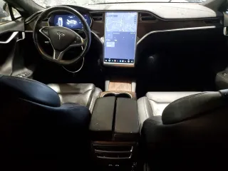 2017 Tesla Model S 100D with VIN 5YJSA1E29HF210731, listed as a Copart auction lot 56762565 with 114,117 mi miles and Salvage title. Bid and sale history available at DreamBid. Image 8.