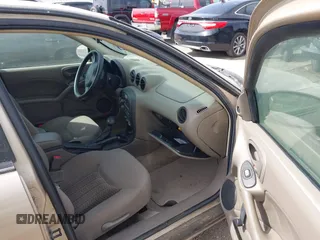 2003 Pontiac Grand Am SE with VIN 1G2NE52F73C171244, listed as a IAAI auction lot 41572797 with 5 mi miles. Bid and sale history available at carsss.com. Image 5.