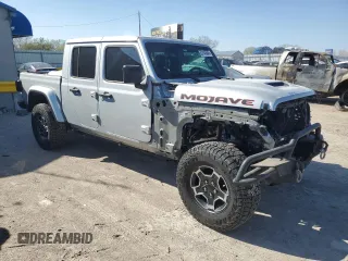 2023 Jeep Gladiator Mojave with VIN 1C6JJTEGXPL547222, listed as a Copart auction lot 52143545 with 28,586 mi miles and Salvage title. Bid and sale history available at DreamBid. Image 4.