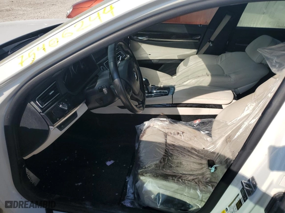 2013 BMW 7 Series 740Li with VIN WBAYE4C57DD137483, listed as a Copart auction lot 75406244 with 0 mi miles and Salvage Title. Bid and sale history available at carsss.com. Image 7.