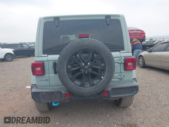 2024 Jeep Wrangler Sahara z VIN 1C4RJXP64RW233090, wystawiony jako IAAI lot #42772286 z przebiegiem 36 278 mil mil oraz . Historia ofert i sprzedaży dostępna na DreamBid. Obrazek 16.