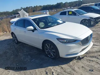 2020 Mazda 6 Signature with VIN JM1GL1XY0L1515151, listed as a IAAI auction lot 41499318 with 46,474 mi miles and . Bid and sale history available at DreamBid. Image 1.
