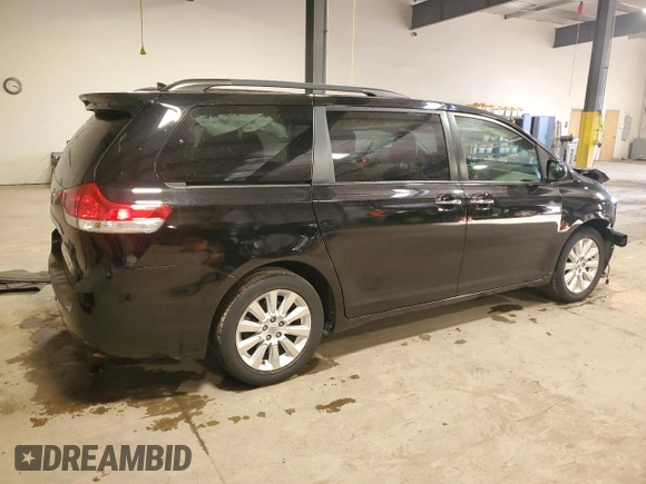 2011 Toyota Sienna XLE with VIN 5TDDK3DC1BS028679, listed as a Copart auction lot 52450655 with 114,054 mi miles and Salvage Title. Bid and sale history available at carsss.com. Image 3.