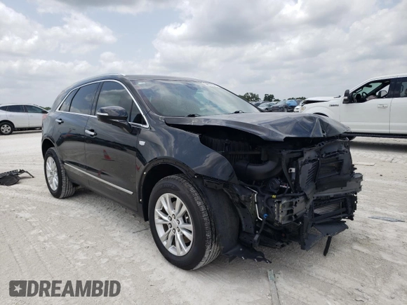 2020 Cadillac XT5 Luxury FWD z VIN 1GYKNAR49LZ197878, wystawiony jako Copart lot #54727524 z przebiegiem 37 990 mil mil oraz Nie do naprawy • Non repairable. Historia ofert i sprzedaży dostępna na DreamBid. Obrazek 4.