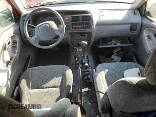 2004 Chevrolet Tracker ZR2 z VIN 2CNBJ734X46910549, wystawiony jako Copart lot #80849894 z przebiegiem Nie podano mil oraz Szkoda całkowita • Salvage title. Historia ofert i sprzedaży dostępna na DreamBid. Obrazek 8.