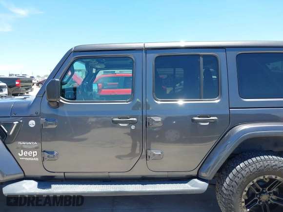 2018 Jeep Wrangler Unlimited Sahara with VIN 1C4HJXEN1JW236779, listed as a IAAI auction lot 42238158 with 72,879 mi miles and . Bid and sale history available at DreamBid. Image 15.