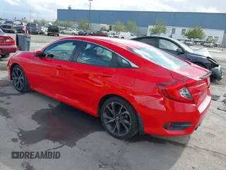 2019 Honda Civic Sport with VIN 2HGFC2F8XKH518773, listed as a IAAI auction lot 41934846 with 140,684 mi miles and . Bid and sale history available at DreamBid. Image 3.