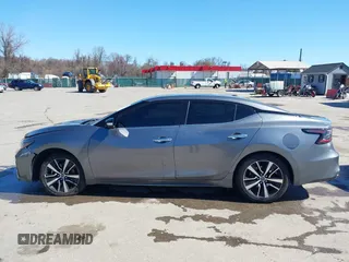 2021 Nissan Maxima SV z VIN 1N4AA6CV4MC508977, wystawiony jako IAAI lot #41858232 z przebiegiem 66 113 mil mil oraz . Historia ofert i sprzedaży dostępna na DreamBid. Obrazek 15.