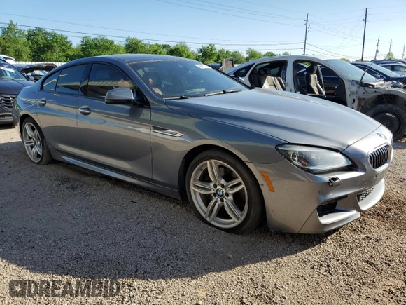 2014 BMW 6 Series 650i xDrive z VIN WBA6B4C53ED371461, wystawiony jako Copart lot #51136055 z przebiegiem 143 213 mil mil oraz Tytuł czysty. Historia ofert i sprzedaży dostępna na DreamBid. Obrazek 4.