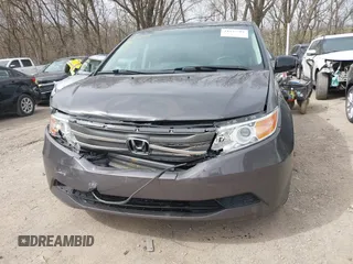 2012 Honda Odyssey EX-L with VIN 5FNRL5H60CB081866, listed as a IAAI auction lot 41835701 with 151,236 mi miles and . Bid and sale history available at DreamBid. Image 6.