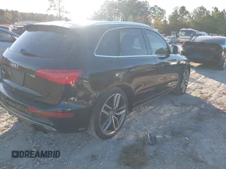 2014 Audi SQ5 Prestige with VIN WA1VGAFP6EA100952, listed as a IAAI auction lot 41006756 with 122,366 mi miles. Bid and sale history available at carsss.com. Image 4.