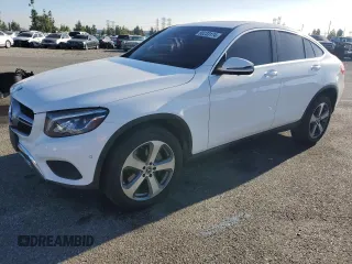2019 Mercedes-Benz GLC with VIN WDC0J4KB0KF569301, listed as a Copart auction lot 80233174 with 83,748 mi miles and Salvage Title. Bid and sale history available at carsss.com. Image 1.